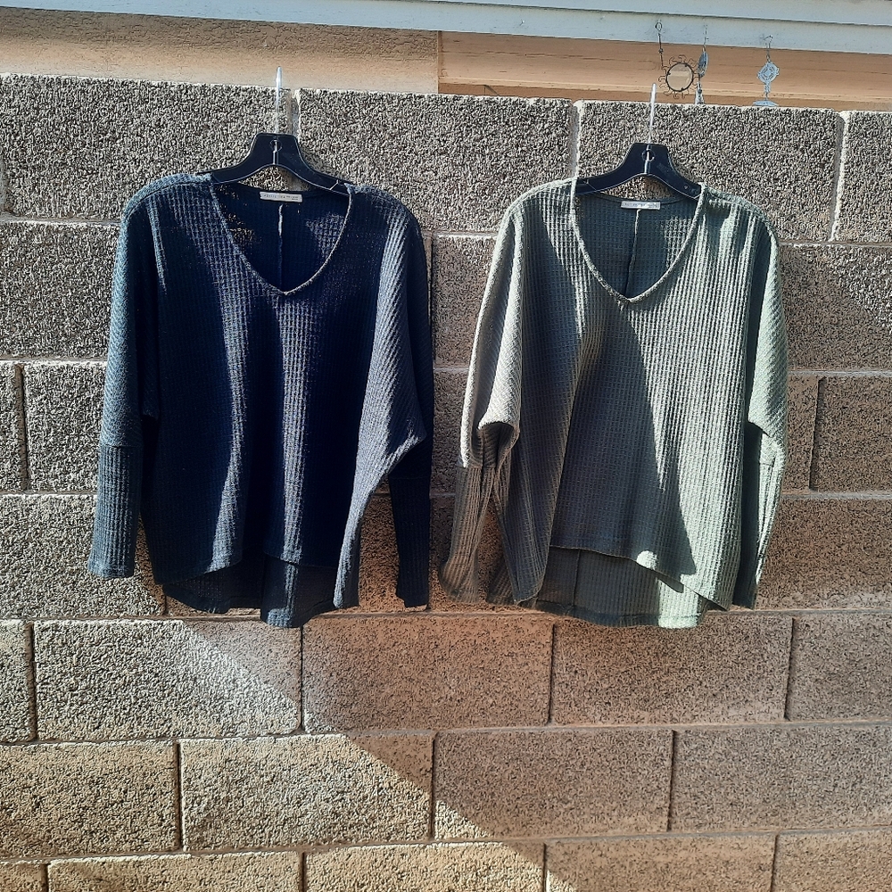 Lightweight high low ribbed sweaters.